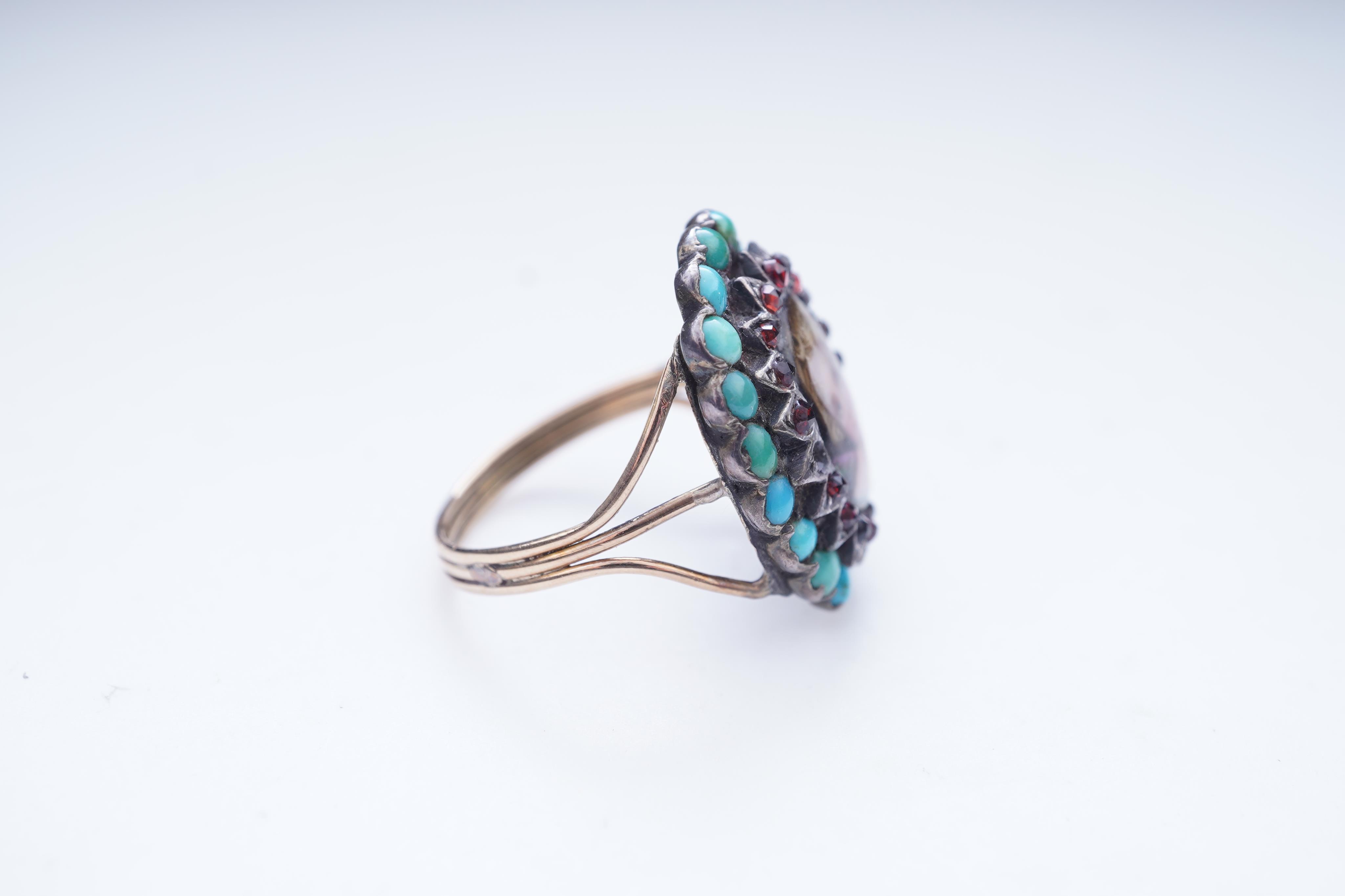 An enamel miniature, turquoise and garnet ring